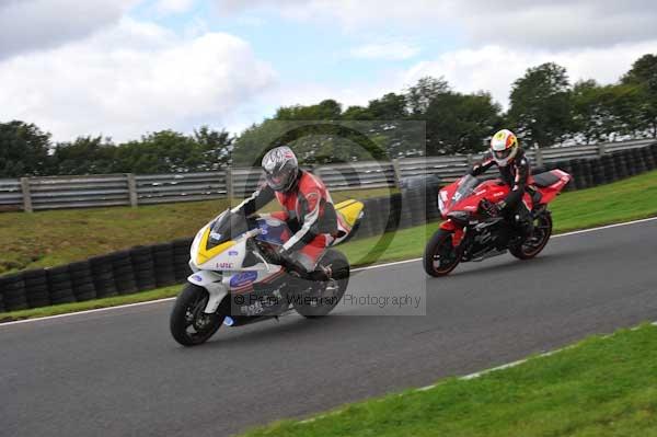 Motorcycle action photographs;cadwell;cadwell park photographs;event digital images;eventdigitalimages;motor racing louth lincolnshire;no limits trackday;peter wileman photography;trackday;trackday digital images;trackday photos