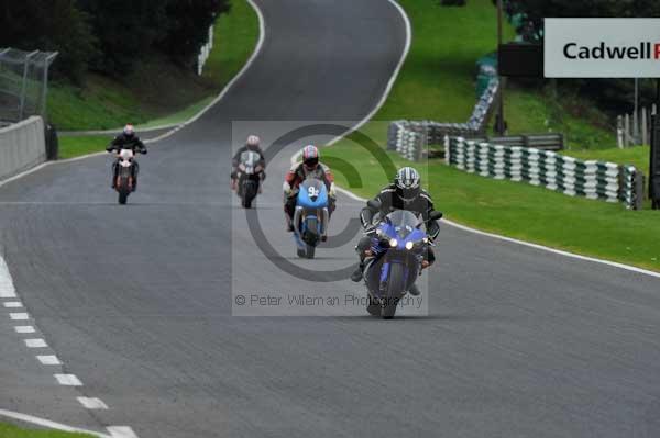 Motorcycle action photographs;cadwell;cadwell park photographs;event digital images;eventdigitalimages;motor racing louth lincolnshire;no limits trackday;peter wileman photography;trackday;trackday digital images;trackday photos