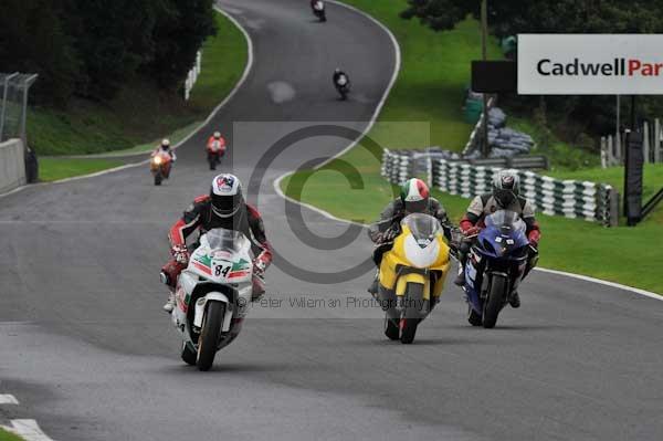 Motorcycle action photographs;cadwell;cadwell park photographs;event digital images;eventdigitalimages;motor racing louth lincolnshire;no limits trackday;peter wileman photography;trackday;trackday digital images;trackday photos