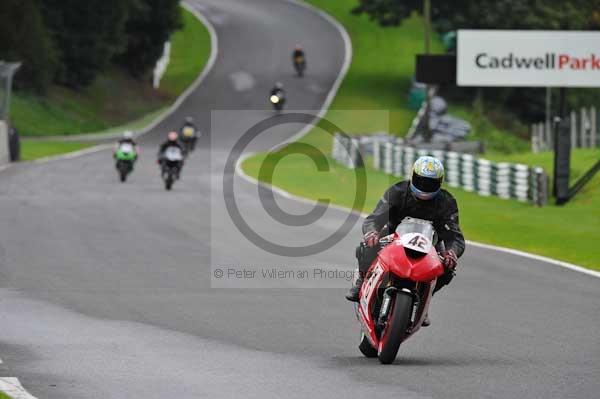 Motorcycle action photographs;cadwell;cadwell park photographs;event digital images;eventdigitalimages;motor racing louth lincolnshire;no limits trackday;peter wileman photography;trackday;trackday digital images;trackday photos