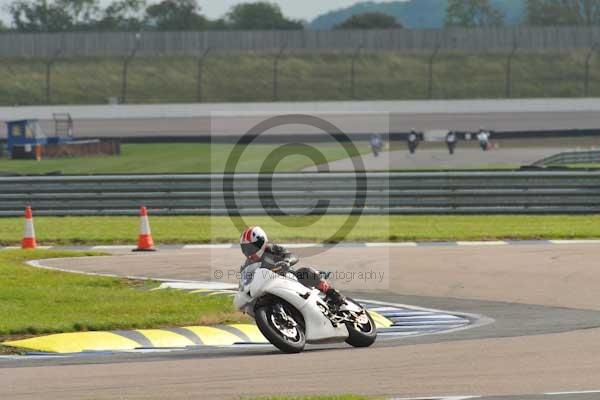 Motorcycle action photographs;Rockingham;Rockingham photographs;Trackday digital images;event digital images;eventdigitalimages;no limits trackday;peter wileman photography;rockingham corby northamptonshire;trackday;trackday photos