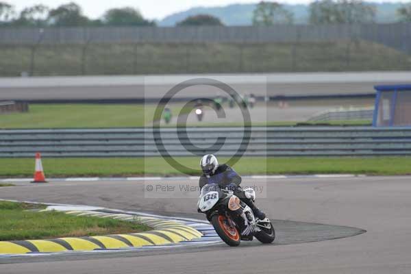 Motorcycle action photographs;Rockingham;Rockingham photographs;Trackday digital images;event digital images;eventdigitalimages;no limits trackday;peter wileman photography;rockingham corby northamptonshire;trackday;trackday photos