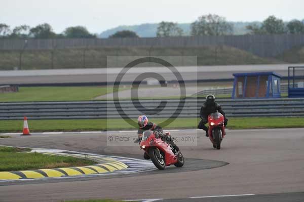 Motorcycle action photographs;Rockingham;Rockingham photographs;Trackday digital images;event digital images;eventdigitalimages;no limits trackday;peter wileman photography;rockingham corby northamptonshire;trackday;trackday photos